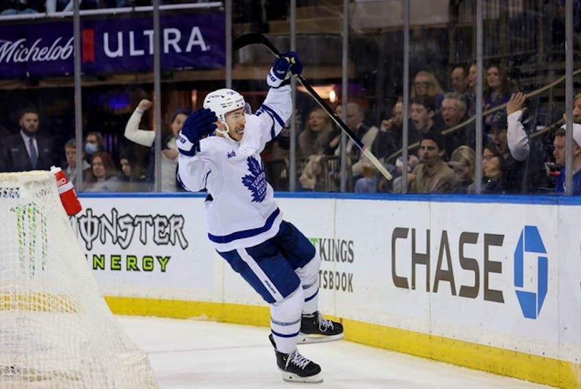 Maple Leafs left wing Michael Bunting celebrates his goal against the New York Rangers on Thursday night. Bunting now has at least a point in 10 consecutive games.
