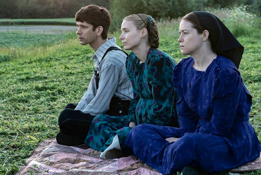  From left, Ben Whishaw, Rooney Mara as Ona and Claire Foy as August, Ona and Salome in Women Talking.  Michael Gibson / Orion Pictures