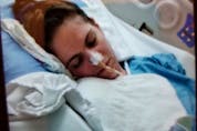 Laura unresponsive and in a deep coma in hospital