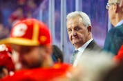  Oct 25, 2022; Calgary, Alberta, CAN; Calgary Flames head coach Darryl Sutter on his bench against the Pittsburgh Penguins during the third period at Scotiabank Saddledome.