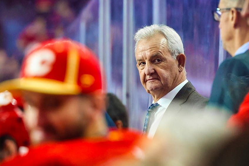  Oct 25, 2022; Calgary, Alberta, CAN; Calgary Flames head coach Darryl Sutter on his bench against the Pittsburgh Penguins during the third period at Scotiabank Saddledome.