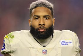 Wide receiver Odell Beckham Jr. of the Los Angeles Rams stands on the sidelines during the third quarter of the NFL game against the Arizona Cardinals at State Farm Stadium on December 13, 2021 in Glendale, Arizona. The Rams defeated the Cardinals 30-23.   