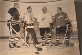 Pictured a number of years ago clutching their Tim Hortons coffee in one hand and their wooden Sherwood, Titan and Louisville hockey sticks in the other are ‘Billy Hockey’ players Duncan Randall (left), Ron MacKenzie, Ron MacCormack and namesake Billy McIntyre. Contributed