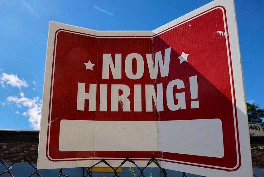 Hiring was flat in November but Canada's jobless rate edged down to 5.1 per cent. 