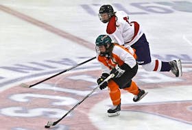 Cape Breton Capers captain Leah Byrne skates the puck into the offensive zone during Atlantic Collegiate Hockey Association action against the Acadia Axewomen in Wolfville last month. The Capers will host the Holland College Hurricanes of Charlottetown in their home opener this weekend in Membertou. CONTRIBUTED/GARY MANNING