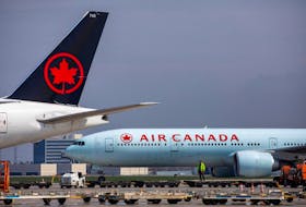 Air Canada planes are parked at Toronto Pearson Airport in Mississauga, Ont., April 28, 2021. 