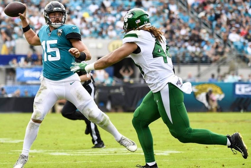 Jacksonville Jaguars quarterback Gardner Minshew looks to pass the ball during the third quarter against the New York Jets at TIAA Bank Field. 