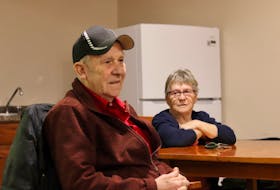 Wayne Casford, left, and Bertha McPhee, residents of the provincially-owned senior’s complex at 9 Champion Ct. in Charlottetown, say the Department of Social Development and Housing has repeatedly promised his fellow residents the world, but fails to finish projects and follow through.  Logan MacLean • The Guardian