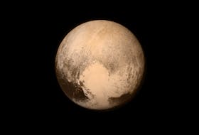 Pluto as seen from the New Horizons spacecraft in 2015. If the skies are clear enough and you have access to a star chart and a telescope, it will be possible to view Pluto and all of the solar system’s planets, not to mention the moon, in the night sky during the last week of 2022. NASA photo/Unsplash