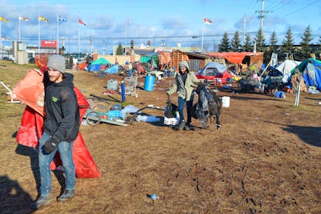 UPDATE: Workers clearing Charlottetown tent encampment in P.E.I. of fire hazards, but eviction not coming yet