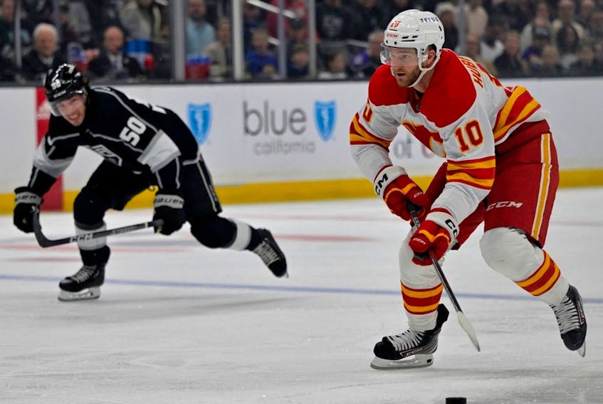 Calgary Flames forward Jonathan Huberdeau beats Los Angeles Kings defenceman Sean Durzi down ice for a goal in the first period at Crypto.com Arena in Los Angeles on Thursday, Dec. 22, 2022. But in overtime, Huberdeau passed up a couple of golden opportunities to shoot.