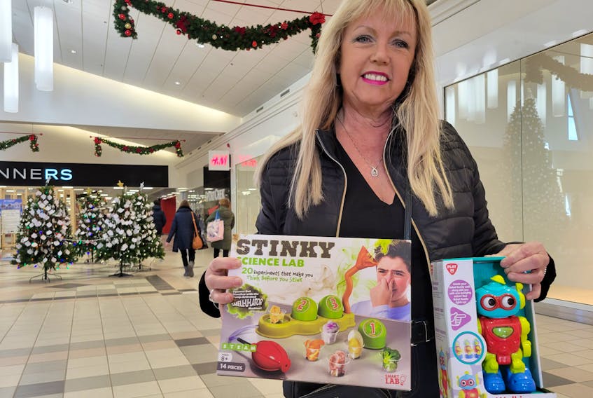 Beverly Hambly says her Christmas Eve shopping was just for a few final items for her grandchildren, aged one and seven. - Logan MacLean • The Guardian