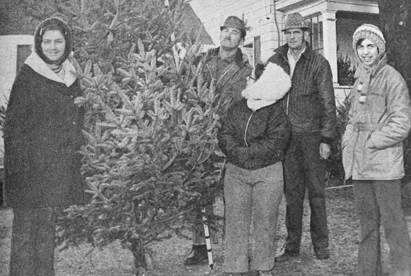 For the third year in a row, Sam Rafuse donated a Christmas tree to the residents of King’s Meadows in Windsor. Pictured at the 1972 tree delivery is, from left, Sandra Innes, Sam Rafuse, Cynthia Hewey, W. Barkhouse, and Sherri Chislett.