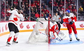 Bedard shines as Canada routs Germany 11-2