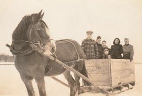 G. Keith Pickard, architect and veteran of the Second World War, and his family enjoy a sleigh ride on the ice near Victoria Park in the 1940s. The Pickards lived in West Royalty, and in the winter, travelling by ice was an easier method of reaching Charlottetown than the roads — and probably a lot more fun. This is one of the images featured in the pop-up exhibit, Happy Holidays – a partnership between the City of Charlottetown, The Prince Edward Island Regiment Museum and the P.E.I. Museum and Heritage Foundation. The exhibit is open to the public until Jan. 6 and can be found on the first floor of the Confederation Court Mall. Contributed