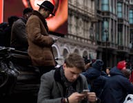 Cellphones, and people engrossed in them, are ubiquitous in society these days. Unsplash photo