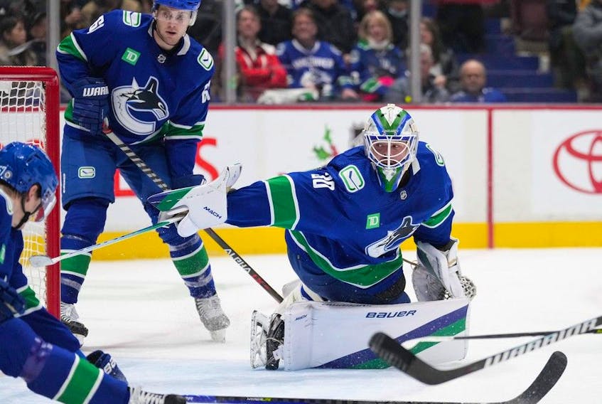 Canucks goalie Spencer Martin, looking back as the puck enters the net during Thursday’s 5-1 loss to the Florida Panthers, will be looked on to carry the netminding load in the absence of the injured Thatcher Demko. Martin has been solid, but not spectacular this season.