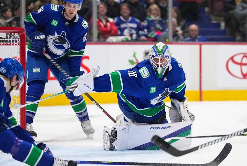 Vancouver Canucks goalie Spencer Martin allows a goal to Florida Panthers' Sam Bennett during the second period of an NHL hockey game in Vancouver, on Thursday, December 1, 2022.