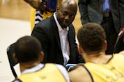  Edmonton Stingers head coach and general manager Jermaine Small speaks with players as they battle the Fraser Valley Bandits at the Edmonton Expo Centre on Aug. 1, 2019.