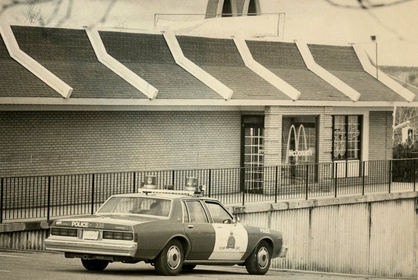 A RCMP cruiser sits outside the King`s Road McDonald`s in Sydney River where four employees were shot on May 7, 1992. (Malcom Dunlop)