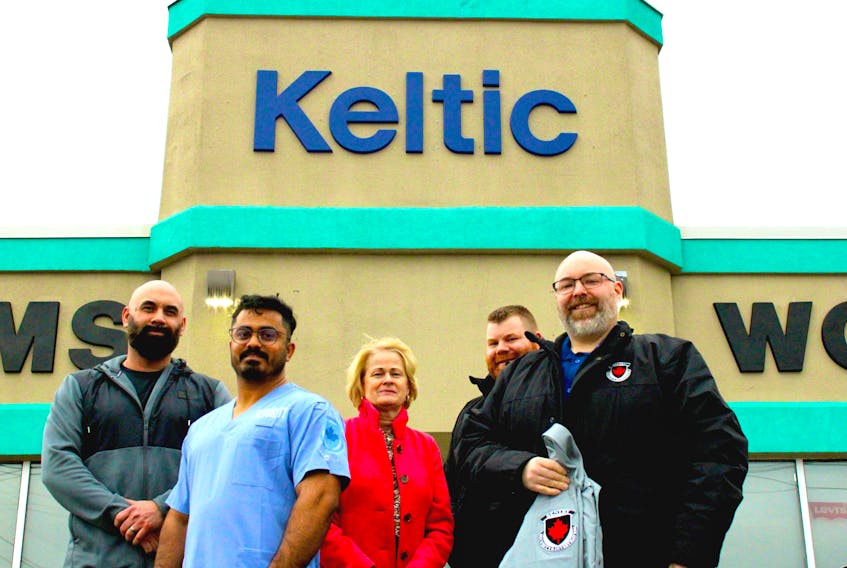 Sentry Security has developed a new uniform for some of its work in hospitals. From left are Sentry co-owner Terry MacDonald, Sentry operations manager Kishan Vasani (wearing the new uniform), Keltic Clothing co-owner Katherine VanNostrand, Sentry co-owners Peter Smits and Ian Townsend.. Contributed