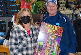 Kelly Burke and Cecil Burke of Framboise, NS with their New Year's Eve fireworks from Olympic Shoe Repair.  Fireworks have been a popular purchase leading up to New Year’s Eve in Cape Breton. Kelly Burke and Cecil Burke of Framboise are shown with their party fireworks they purchased from Olympic Shoe Repair. SHANNON LEE/CAPE BRETON POST