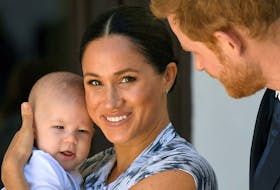 The Duke and Duchess of Sussex, Harry and Meghan, hold their first child, Archie in 2020. The British press has been consistently vile and not always truthful about the royal couple.