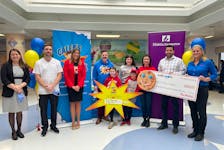 Jennifer Swan, Manager of Women’s Health, left, Matthew MacDonald, RN, Caitlyn MacDonald, Manager of Philanthropy, Mike, Aubriegh, Nicole; Emmy, front left, and Lauchie MacArthur of Caleb’s family, Troy Wilson of Tim Hortons, Karen Hatcher of Tim Hortons holding the cheque for Caleb's Courage. Contributed