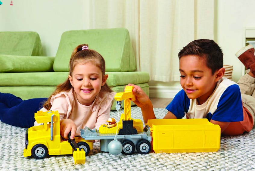 Kids playing with PAW Patrol Mega Rubble Big Rig Vehicle. (supplied)