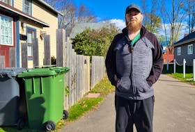 Craig Jones, a Charlottetown resident, stands in front of the narrow lane where he lives. Island Waste Management did not collect garbage on his street from Sept. 1 until Oct. 24. Logan MacLean • The Guardian