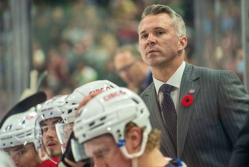 Montreal Canadiens head coach Martin St.-Louis looks on during the first period against the Minnesota Wild at Xcel Energy Center in Saint Paul, Minn., on Nov. 1, 2022.