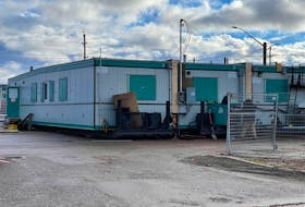 Originally slated to open mid-November, the province's modular emergency shelters on Park Street in Charlottetown were still closed when workers could be seen preparing the shelters for power on Dec. 1. Cody McEachern • The Guardian