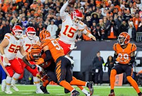 Chiefs quarterback Patrick Mahomes rushes for a touchdown against the Cincinnati during the third quarter in Cincinnati yesterday. The Bengals won 27-24. 