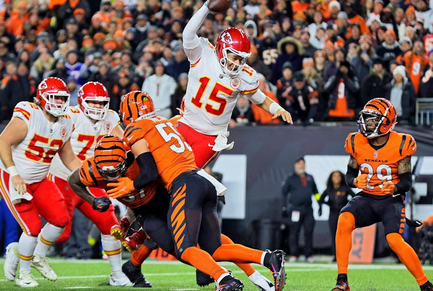 Chiefs quarterback Patrick Mahomes rushes for a touchdown against the Cincinnati during the third quarter in Cincinnati yesterday. The Bengals won 27-24. 