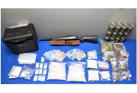 Charlottetown police seized weapons, drugs and cash during a home search in the city on Dec. 3. Contributed