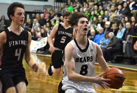 In this file photo, Aaron MacLean of the Breton Education Centre Bears, right, looks towards the basket as he's chased by Sawyer Ryan of the Montague Vikings during New Waterford Coal Bowl Classic action at the BEC gym. For the first time in two years, the Coal Bowl Classic will return to the community next month after a pair of COVID-19 pandemic cancellations. JEREMY FRASER/CAPE BRETON POST