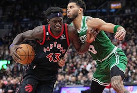 Raptors forward Pascal Siakam (left) drives to the net against Celtics forward Jayson Tatum (right) during second half NBA action at Scotiabank Arena in Toronto, Monday, Dec. 5, 2022.