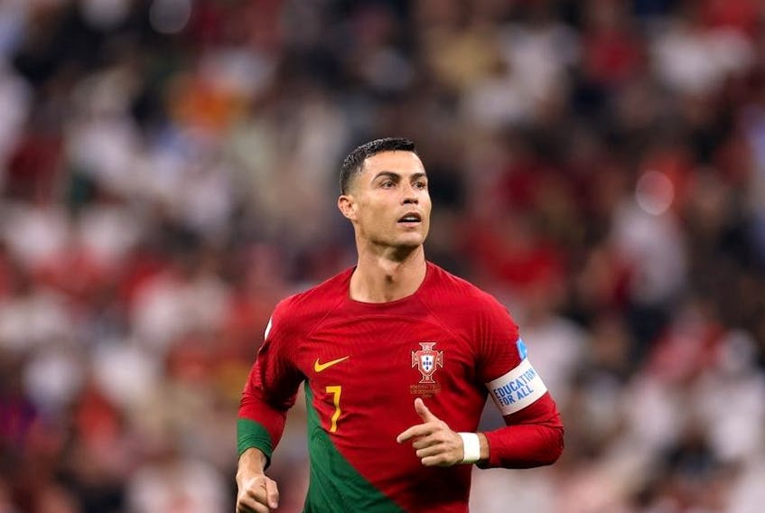 Cristiano Ronaldo of Portugal looks on  during the FIFA World Cup Qatar 2022 Round of 16 match between Portugal and Switzerland at Lusail Stadium on December 06, 2022 in Lusail City, Qatar.