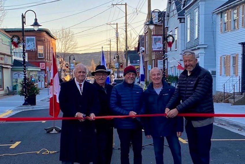 Politicians take part in the ribbon-cutting ceremony for the Queen Street renovations in Bridgetown on Dec. 2. From left are Annapolis County Warden Alex Morrison, Coun. Bruce Prout, former warden/councillor Alan Parish, Coun. David Hudson and John Lohr, Nova Scotia's Municipal Affairs minister.