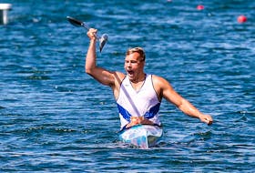 Craig Johnson of Dartmouth celebrates after winning gold in the men’s K-1 1,000 metres at the Welland International Flatwater Centre. Communications Nova Scotia/Len Wagg