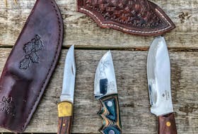 Here's Paul Smith’s Buck Folding Hunter, on the left, alongside a couple of his dedicated skinning knives. Contributed photo