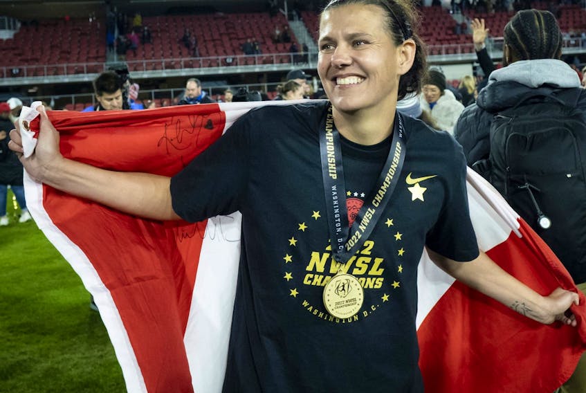 Burnaby native Christine Sinclair, draped in the Canadian flag after her Portland Thorns won this year’s National Women’s Soccer League Championship final, is a consultant to and face of a new women’s pro league being launched in Canada.