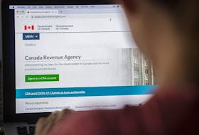  A person looks at the Canada Revenue Agency homepage in Montreal.