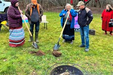 Mona Denny, second from right, at the sod turning on Wednesday in We'koqma'q First Nation where a commemorative park for missing and murdered Indigenous women and girls will be. CONTRIBUTED