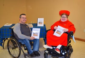 Nancy Marshall has written a book about dealing with depression. She held a launch on Dec. 2. Her case worker from Nova Scotia Works Jason MacDonald, left, attended.