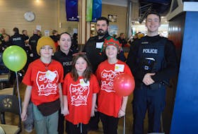 It was a busy day of shopping at the Mayflower Mall for regional police officers and 39 students from the Cape Breton Victoria Regional Centre for Education. The event was the annual Shop of the Class. Among the participants were (front from left), Skylar Wall, 10, Zoey Mya, 9, and Nora Berthiaume, 10. Back row from left, Const. Kelsey Axworthy, Const. BJ Petrie and Const. Shawn Fewer-Blanchard, who, in his younger days, was also a participant in the program. CAPE BRETON POST PHOTO