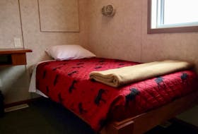 This is one of the single bed rooms at the new emergency overnight shelter on Park Street in Charlottetown. The shelter, which features 50 beds in total, opens in part on Dec. 9 with 25 beds opening at 8:00 p.m. The other 25 open next week. Shelter hours are 8:00 p.m.-8:00 a.m., and clients will be able to store personal items in lockers during day time hours. Clients can stay for up to 30 days and then book a bed again to stay longer. The shelters will be low barrier, meaning clients will not be punished or declined access for being intoxicated, and they can store drugs or alcohol in their stowaway locker, but they will not be allowed to use inside the shelter or keep supplies in the bedroom. With no curfew, clients can access personal items from lockers at any time in the night. - Logan MacLean • The Guardian