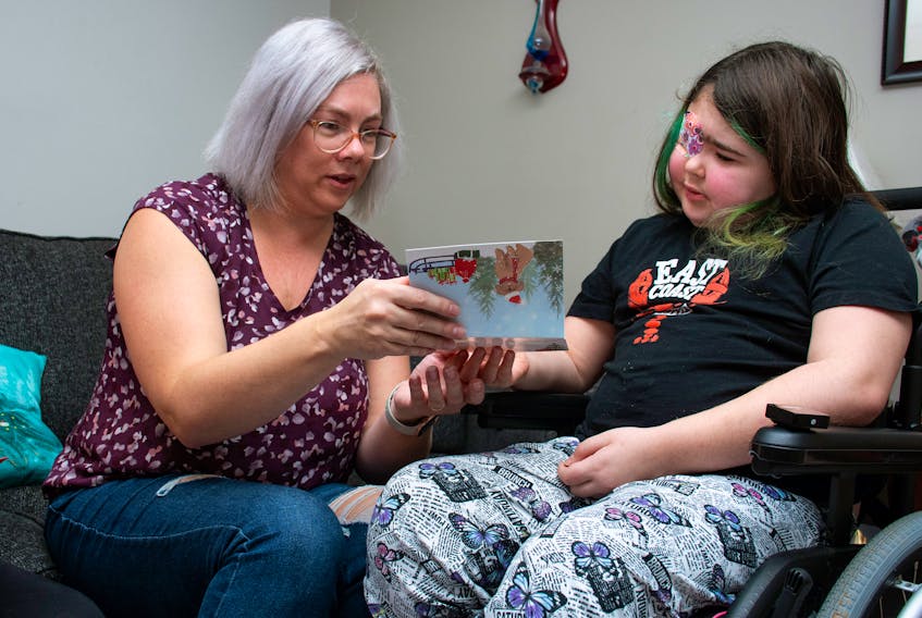 Amy MacInnis looks through one of the hundreds of cards sent to her daughter Sophia at their Lower Sackville home on Thursday, Dec. 9, 2022. Sophia was diagnosed with a rare brain tumour in August.
Ryan Taplin - The Chronicle Herald
