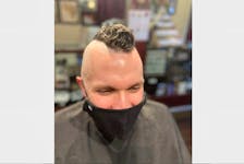 CEC music director John MacLeod agreed to shave most of his head if more than 70 students registered for the high school’s music program. CONTRIBUTED