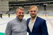 Niklas Brannstrom, left, and his son, Erik Brannstrom, a Senators defenceman, pose for a photo at American Airlines Center in Dallas on Thursday morning.